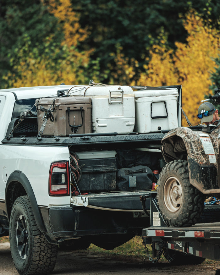 Dodge Ram Heavy Duty Truck Bed Cover ATV Hauling Coolers on top of tonneau cover