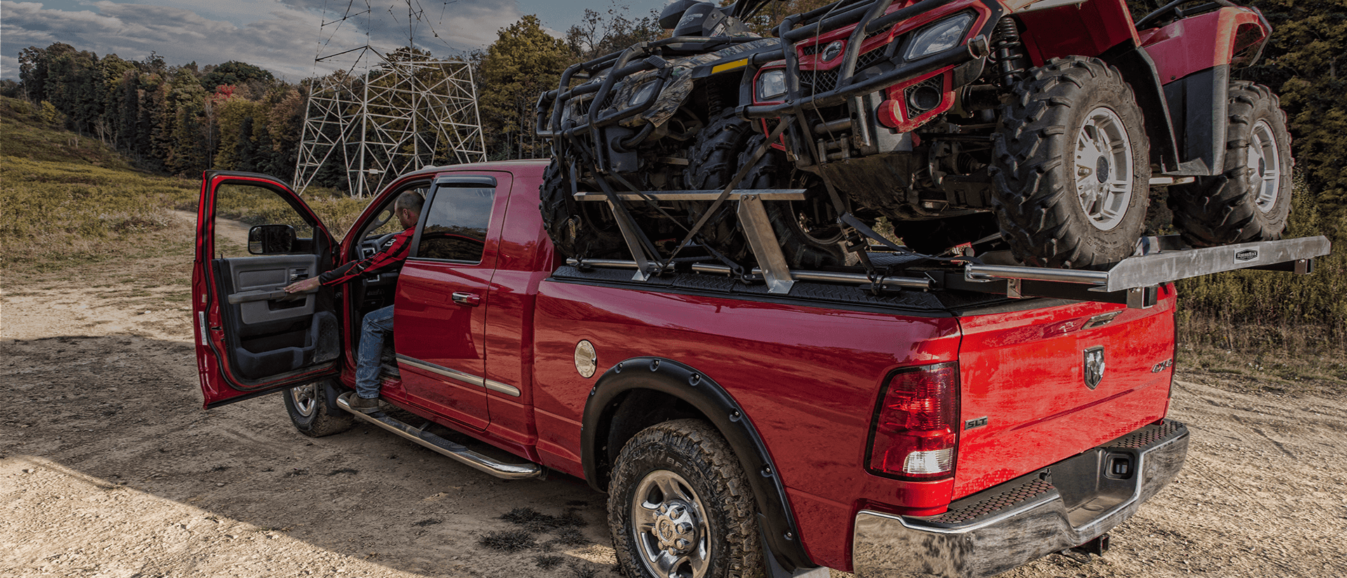 atv carrier with two atvs at trailhead ready to unload