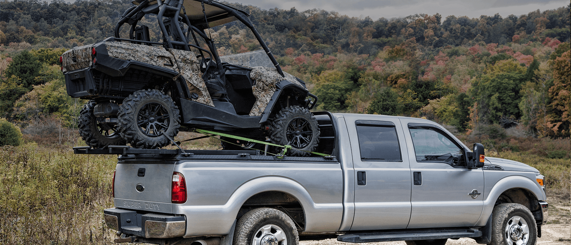 utv carrier with sxs at trailhead